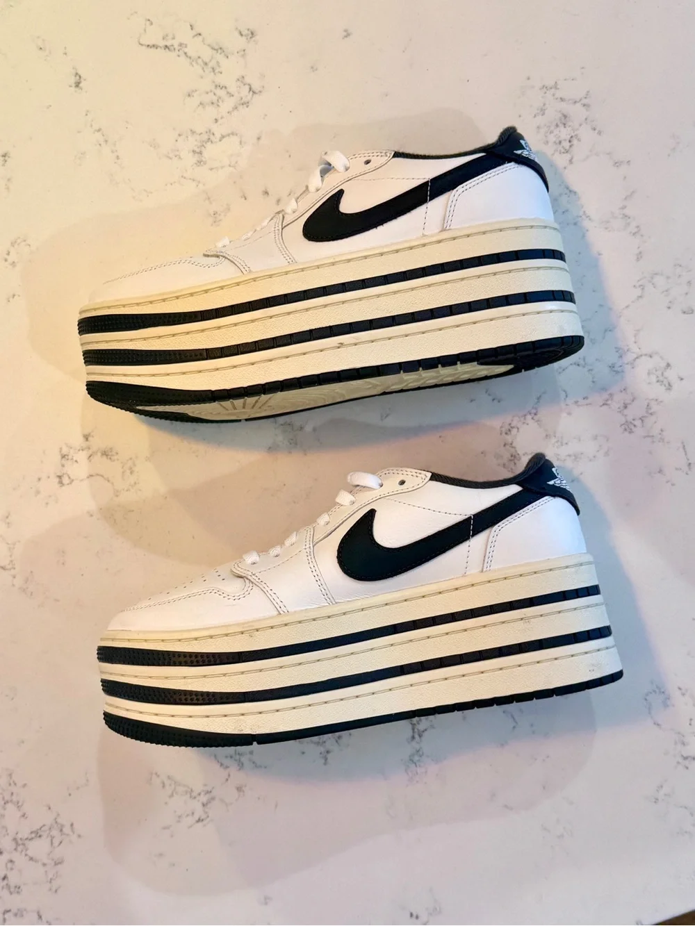 nike women’s air jordan 1 triple stack platform sneakers 9